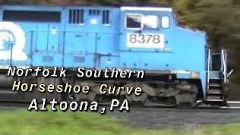 NS eastbound Trailer Train. Horseshoe Curve. Altoona, PA. Date 10-18-03. Time 12:10 pm.