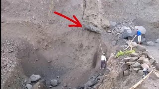 THE BREAKING OF A LARGE ROCK ON A CLIFF