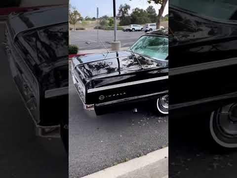 Beautifully restored Black with White/Red interior 1964 Impala SS