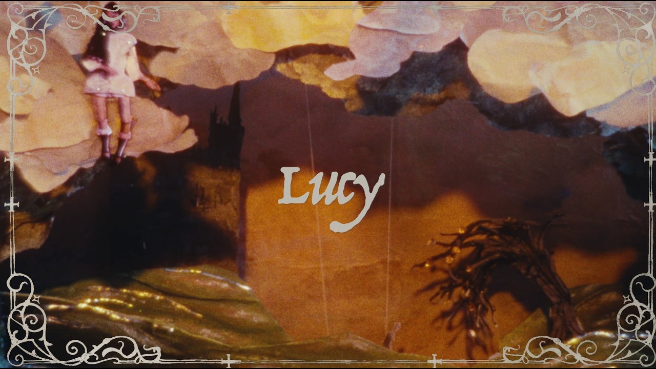 Watch Holly Humberstone - Lucy (Lyric Video) on YouTube Watch Holly Humberstone - Lucy (Lyric Video) on YouTube