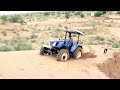 Testing the power and capacity of New Holland 5510 4wd in sand dune