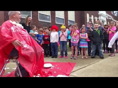 As a reward for exceeding their March reading goal, Cheshire Elementary School principal takes 11 pi