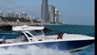 Haulover inlet show boats and fishing boats and jet ski