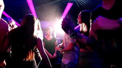 Flythrough Shot Of Energetic Party People Dancing In Club Stock Video   Download Video Clip Now   iS