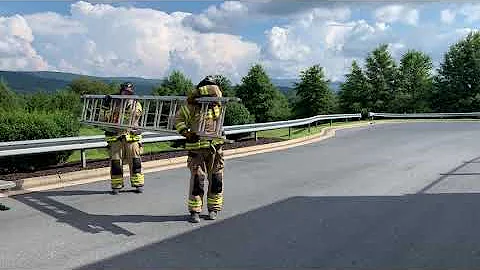 24’ extension ladder - two FF low shoulder carry and flat raise