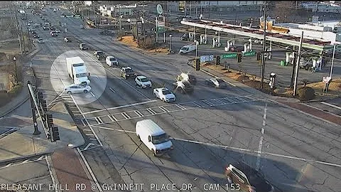 Traffic, dashcam video after truck pushes car through intersection in Gwinnett County