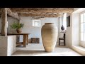 Timeless French Mansion Interiors Inspired by Axel Vervoordt’s Quiet Luxury Approach
