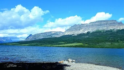 Hiking on St Mary Lake at Beaver Pond Trailhead - ...