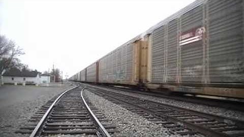 NS Eastbound auto train with 3 unit lashup through McComb Ohio, 3-14-10