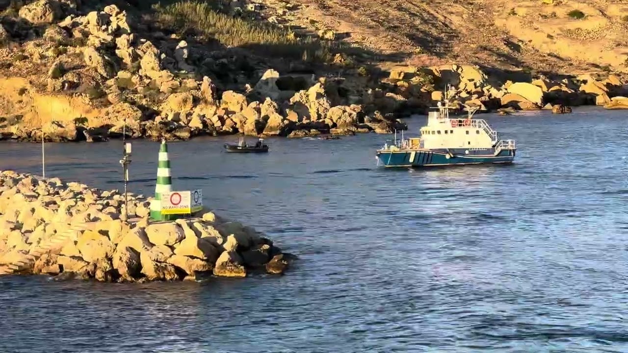 Departing fast Ferry for Valetta and arriving ferry from Malta