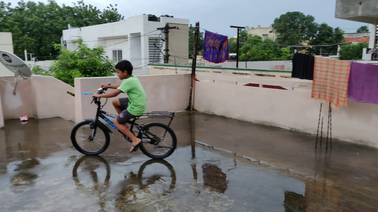 Kids biking on terrace-002