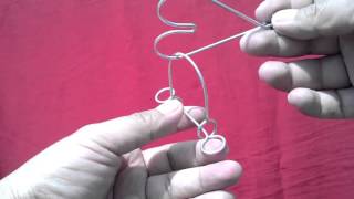 El corazón prensado (Rompecabezas de alambre)