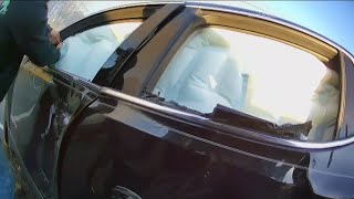 Body camera video captures rescue of mother and child from fiery multi-vehicle crash in Rome