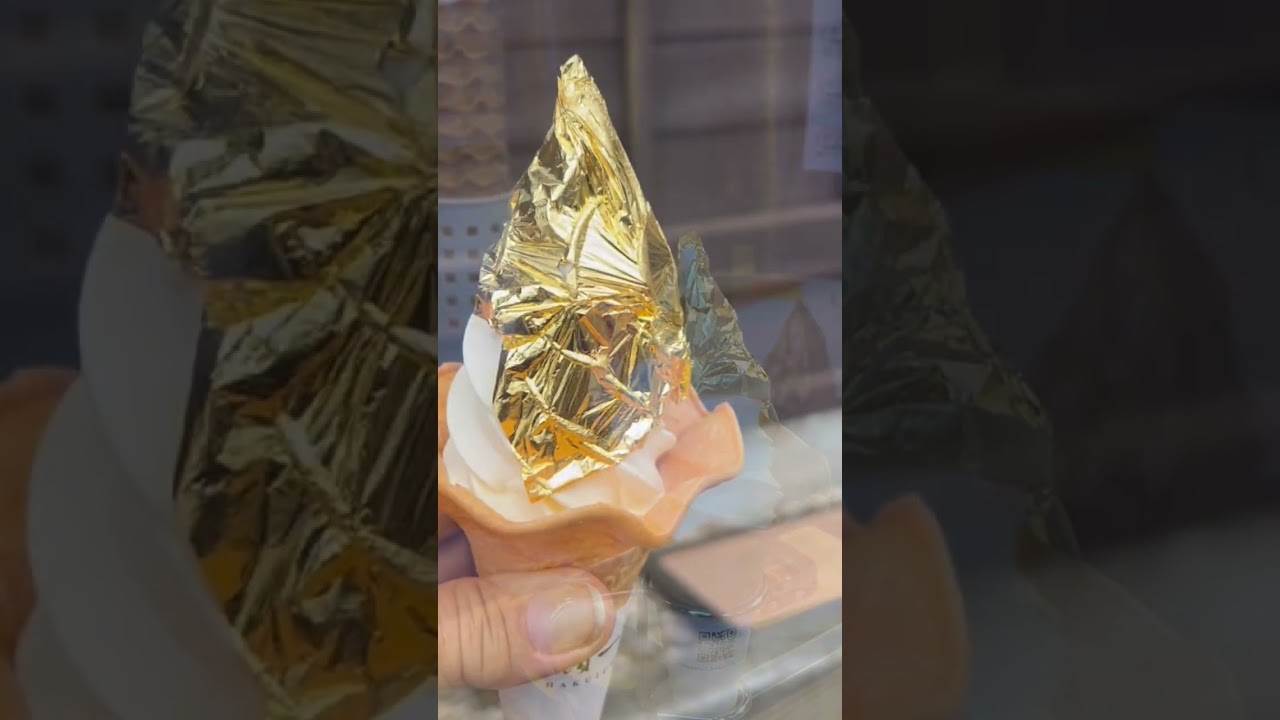 Kanazawa gold leaf ice cream is a famous, a full sheet of edible gold foil placed on creamy vanilla