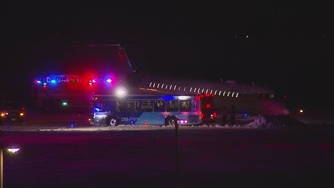 Plane slides off runway at Des Moines International Airport