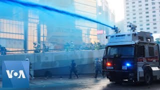 Hong Kong Protesters Clash with Police Outside Central Government Complex