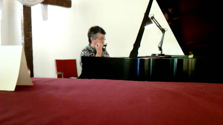 Lisa. Faughnan. Playing piano and harmonica