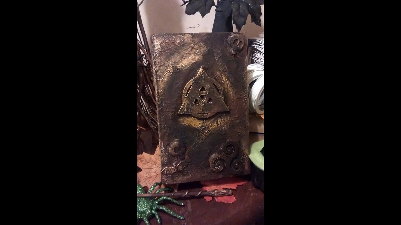 DIY, upcycled book carcass to a Harry Potter/Halloween Spell Book, home decor piece!