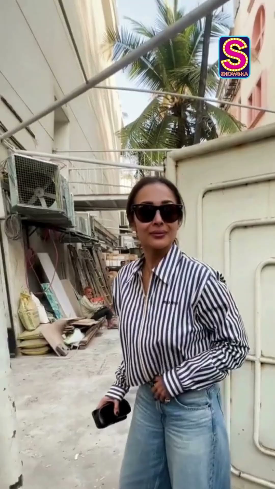 Malaika Arora Gives Strong Boss Lady Vibes As She Pairs Shirt-Denim With Messy Bun | Bollywood| N18S