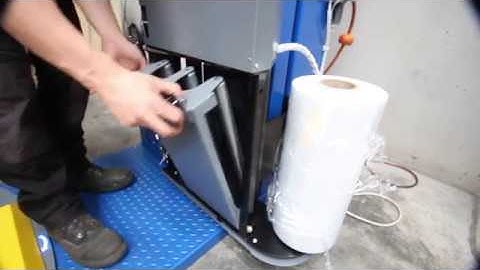 How to Load a roll of Stretch Wrap on an Omni Superplus Pallet Wrapping Machine