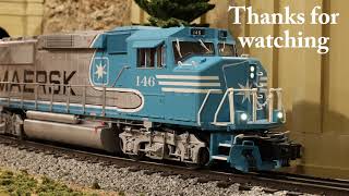 DK's O Gauge Trains - Lionel's "Maersk Stack Train" hauling blue Maersk Well Cars & Containers