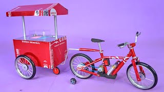 Increíble Mini Bicicleta Eléctrica con carrito de venta hecha con Latas de Refresco