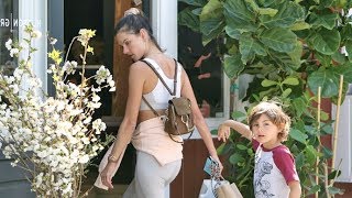 Alessandra Ambrosio Flaunts Fit Form While Shopping For Flowers & Toys With Son Noah