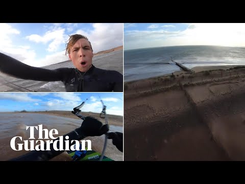 Kitesurfer makes staggering 200-metre leap over sand spit in Devon
