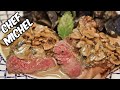 Steak aux champignons flambé