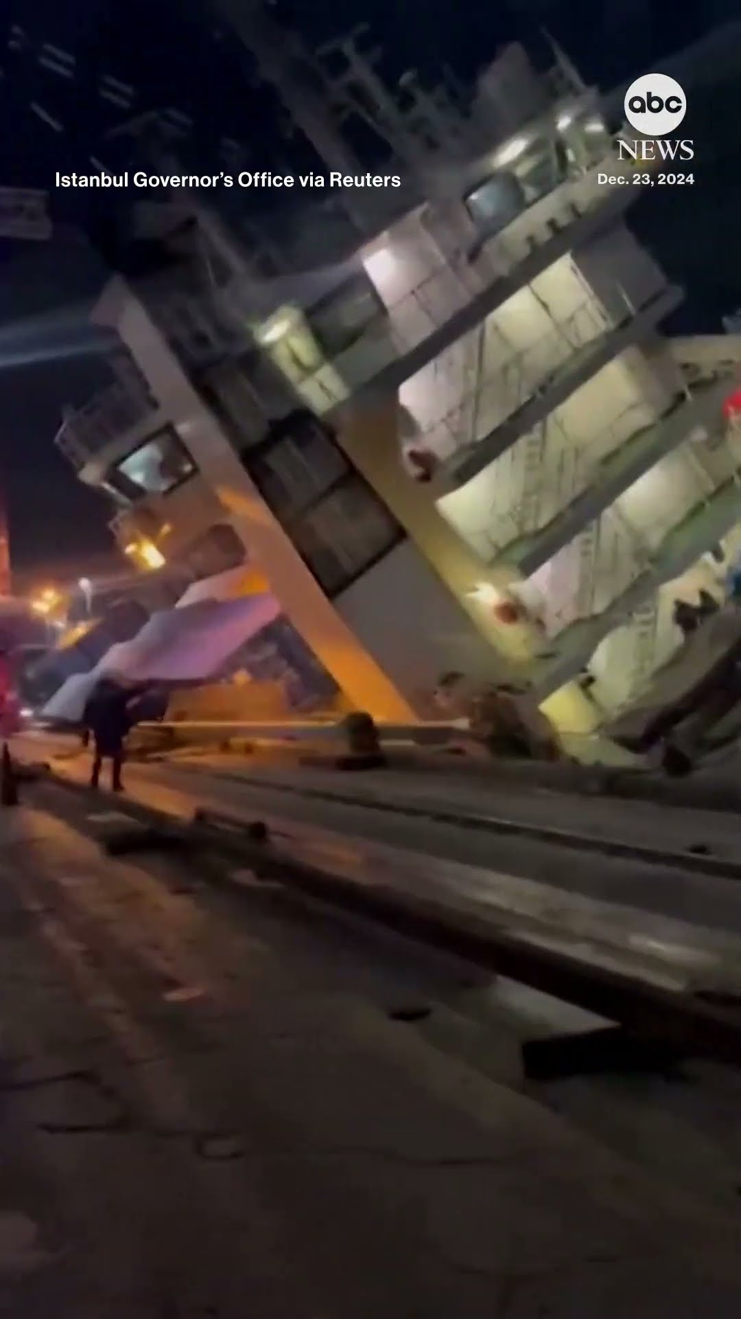 Cargo ship rolls on its side in port - ABC News