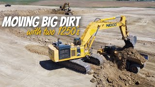 Moving BIG Dirt with two Komatsu 1250s
Two Komatsu 1250s staggered bench loading...oh and a caterpillar 24h even makes an appearance.
The two excavators are working together in the next phase of a subdivision, thats why theres houses close to them.
Fun fact: I built the first section of this subdivision in 2015 when I used to work for Kidco Construction. This is also the same site where I filmed most of the Hitachi 1200 videos I did in 2015 and 2016. Moving BIG Dirt with two Komatsu 1250s