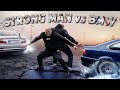 ROLLS ROYCE CULLINAN CIĄGNĄCY E46 przez miasto? | StrongMan VS BMW | Mistrz Europy w E46! image