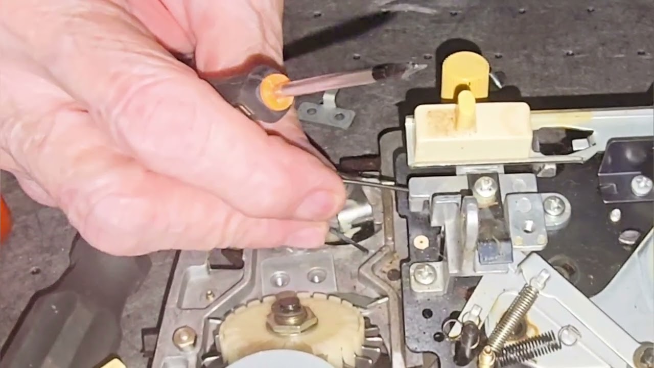 Replacing the Rising spring in  Studio 328 Knit Machine  Carriage 