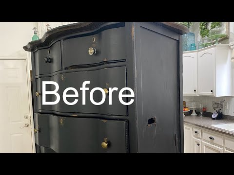 black curved dresser