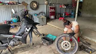 Talented girl: ball bearing replacement, exhaust pipe welding,motorcycle engine maintenance