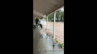 Water Rushes Down Street in Reeds Spring, Missouri, Amid Flash Flood Threat