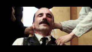 Daniel Plainview gets baptized in There Will Be Blood