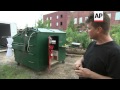 Artist turns dumpster into home from home