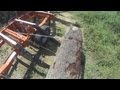 Woodmizer sawmill video: Loading a big Cherry log using the winch