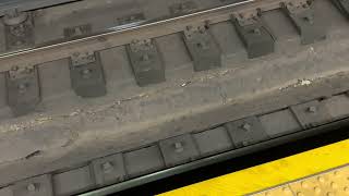 a video of a cigarette butt on nyc subway tracks 8