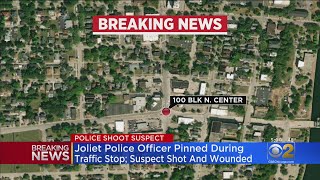 Police Officer Pinned During Traffic Stop; Suspect Shot And Wounded