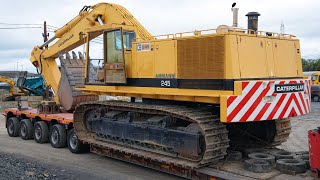 Moving the Caterpillar 245 Excavator