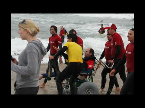 Larry Dubey goes surfing with Life Rolls On Founda...