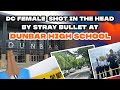 Female student shot in the head through school window