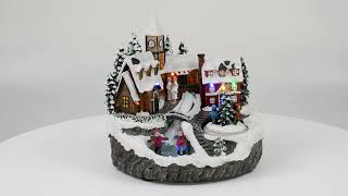 Christmas scenery with river and battery-operated skating rink cm 21x17x21 h video