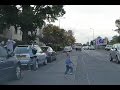 Close Call - Kid runs out in front of car.