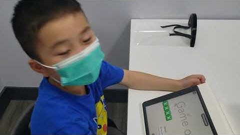 Jay explains his Flappy Bird game during our iPad Game Development Camp