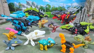 A Box full of dinosaurs Mozasaur, Brachiosaur, Ankylosaur, Baryonyx, Stegosaur, Pteranodon, Robot