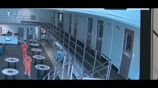 Moment heroic prisoners save police officer's life as he suffers heart attack - Today News