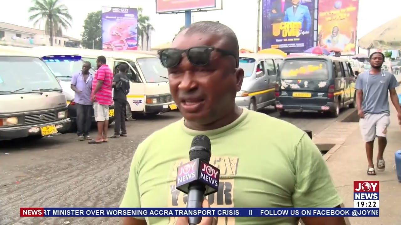 Commercial drivers in Kumasicite traffic and road conditions affecting bus operations.